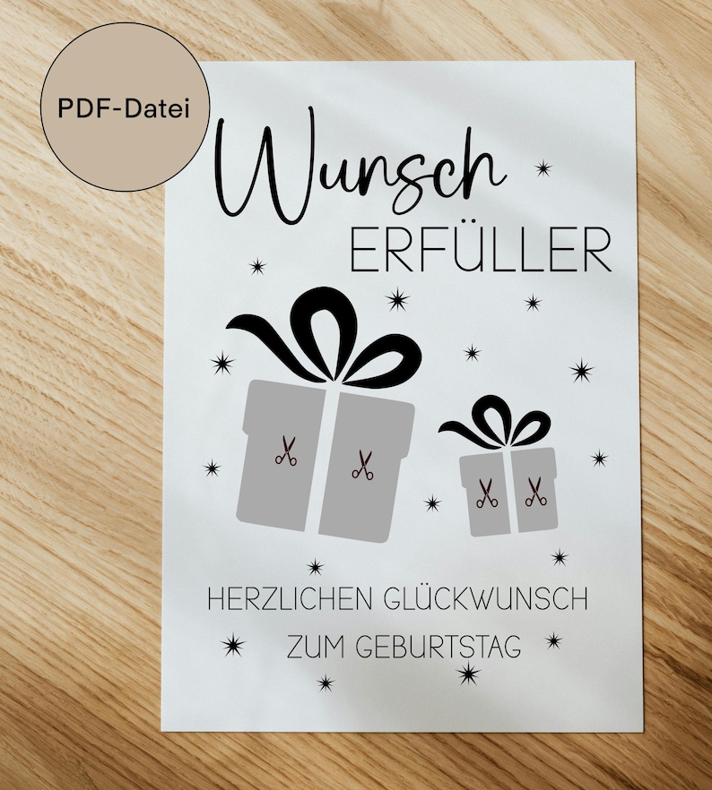 Könnte beinhalten: Eine weiße Karte mit den Worten "Wunsch ERFÜLLER" in schwarzer Schrift, zusammen mit zwei grauen Geschenkboxen mit schwarzen Schleifen und Scheren. Der Text "HERZLICHEN GLÜCKWUNSCH ZUM GEBURTSTAG" ist ebenfalls vorhanden. Ein kreisförmiges Etikett lautet "PDF-Datei im A4-Format".