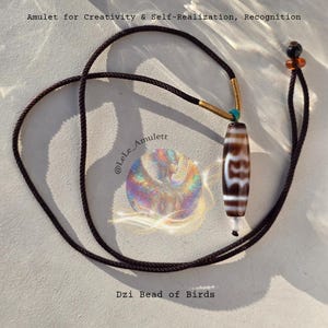 Dzi Bird Pearl: Powerful amulet for creativity & self-realization, recognition for artists, authors, musicians, journalists