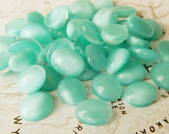 12 Vintage German 10x8mm Oval Soft Aqua Opaque Glass Cabochons (3-21-12)