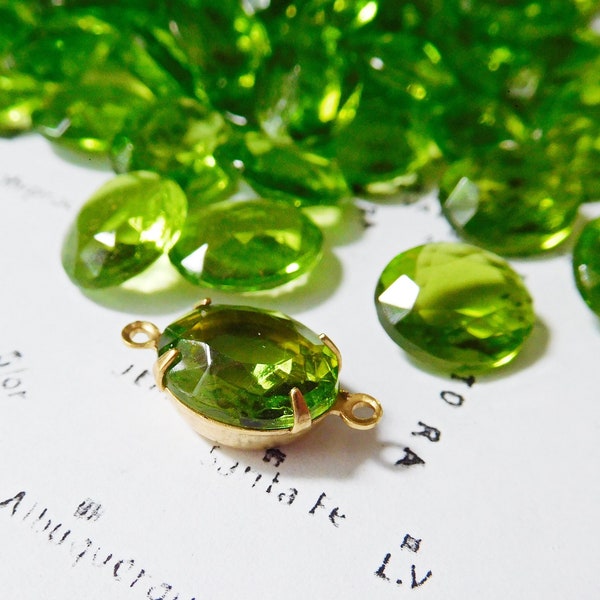 12 Vintage German Olivine Green 12x10mm Oval Transparent Glass Jewels (1-14-12)