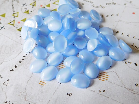 12 Vintage German 10x8mm Oval Soft Light Blue Opaque Glass