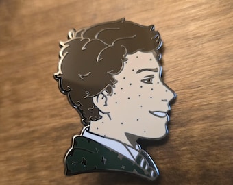 Sebastian and Ominis Enamel Pins
