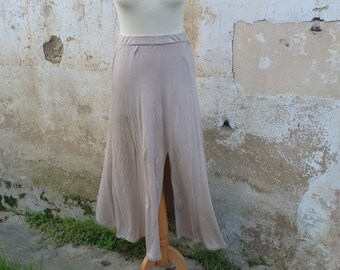 Vintage 1980 jupe en jersey fluide beige fendue