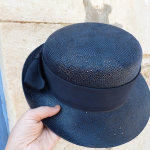 Vintage  made in France Navy blue straw hat  with large gros grain ribbon bow at the back