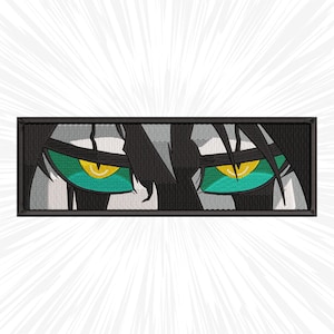 May include: Close-up of a pair of green eyes with yellow pupils, surrounded by black hair. The eyes are set against a light gray background.