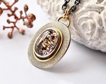 Hematite in quartz pendant in silver and gold, mixed metal, modern contemporary design, one of a kind, gift for her