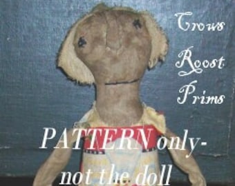 Primitive Volkskunstpuppe Trixie und ihr Wassermelonen-Emuster