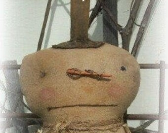 May include: A burlap snowman doll with a twig nose and brown buttons. The doll is wearing a burlap scarf and has the text "Crows Roost Prims" on the front. The text "Pattern Only - NOT THE DOLL!" is at the top of the image.