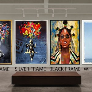 May include: Four framed art pieces displayed in a gallery setting. The art includes a child in a hot air balloon, a girl on a swing, a portrait of a woman, and an abstract blue landscape. Frames are gold, silver, black, and white.