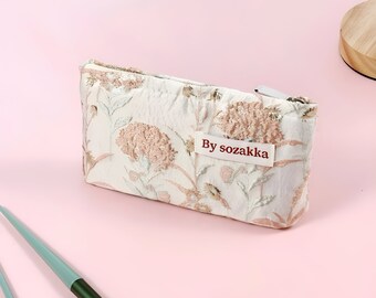 Small pink makeup bag