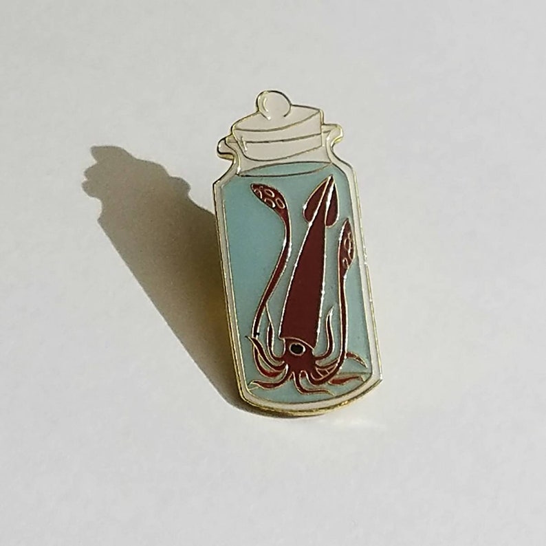 Squid in a Jar Enamel Pin image 1