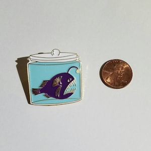Anglerfish in a Jar Enamel Pin (glows in the dark!)