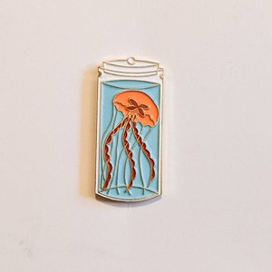 Jellyfish in a Jar Enamel Pin (glows in the dark!)