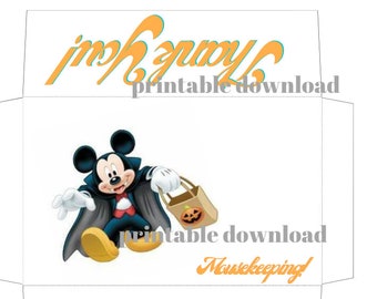 May include: Printable Halloween treat bag featuring a cartoon image of Mickey Mouse dressed as a vampire holding a pumpkin-shaped bag. The text "Mousekeeping!" is printed in orange at the bottom of the bag.