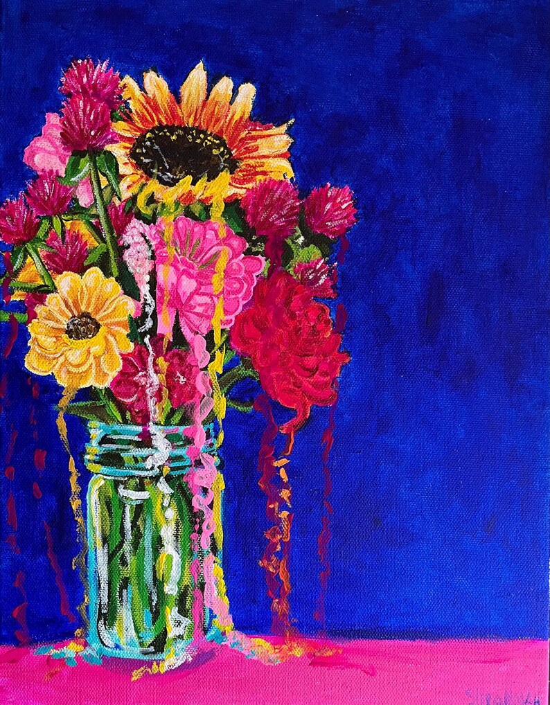 May include: A colorful bouquet of flowers in a clear glass jar with a pink, yellow, and red paint drip effect. The flowers are a mix of sunflowers, red and pink carnations, and yellow daisies. The background is a deep blue.