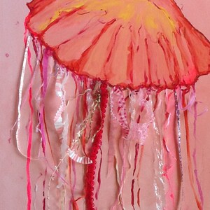 May include: A pink and red jellyfish with long, flowing tentacles made of pink, red, and white ribbons. The jellyfish is painted on a pink background.