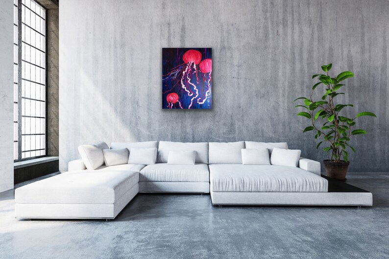 May include: A painting of three pink jellyfish with long, flowing tentacles against a dark blue background.