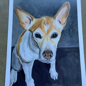 May include: A painting of a dog with white and brown fur. The dog is looking directly at the viewer with a curious expression. The background is a dark blue color.