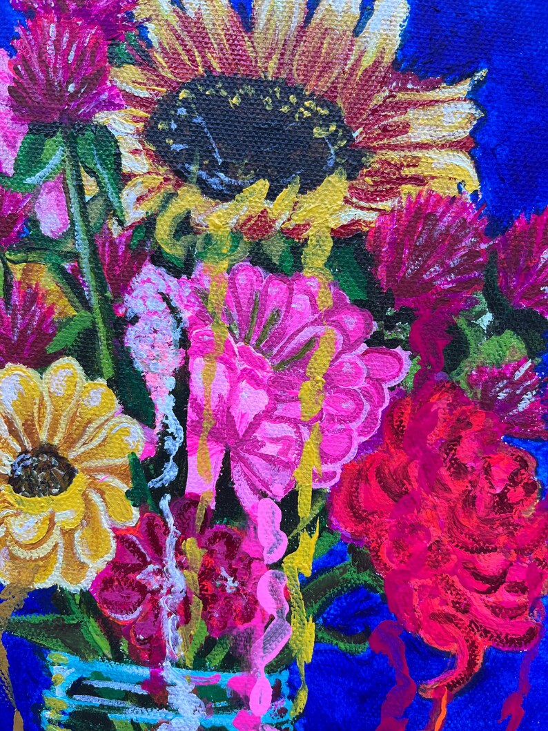 May include: A painting of a bouquet of flowers in a glass jar. The flowers are a mix of pink, yellow, and red. The background is a deep blue.