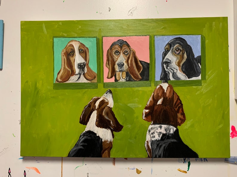May include: Acrylic painting of three basset hounds in square frames against a green background. Two additional basset hounds are painted below the frames, looking up. The painting features brown, black, white, pink, and blue hues.