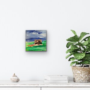 May include: A painting of a small, brown building with a red roof on a green field. The sky is blue with white clouds.