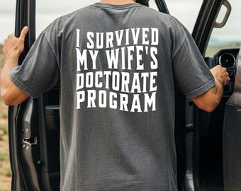 I Survived My Wife’s Graduation Shirt, Funny Masters Degree Tee, Husband Graduation Gift, Graduation Humor Top, College Grad Party Shirt