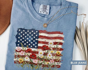 Camiseta con la bandera estadounidense y estampado floral, camiseta patriótica de flores silvestres de EE. UU., camiseta del 4 de julio, camiseta floral del Día de la Independencia, camiseta gráfica de la libertad de Estados Unidos.