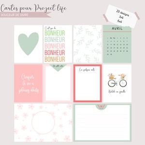 Peut inclure: Ensemble de cartes Project Life avec divers motifs. Les cartes présentent un cœur, des motifs floraux, un calendrier et du texte en français. La palette de couleurs comprend du rose, du vert et du blanc. Disponibles en formats 3x4 et 6x4.