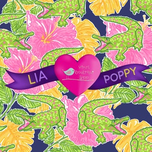 May include: A seamless pattern featuring pink and yellow hibiscus flowers, green alligators, and green leaves on a navy blue background. The pattern includes a pink heart with the text "Vinyl Boutique Shop" and a purple ribbon with the text "LIA POPPY".