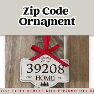 May include: A wooden Christmas ornament with a red ribbon and the text "Christmas 2024" and "39208 Pearl HOME MS".