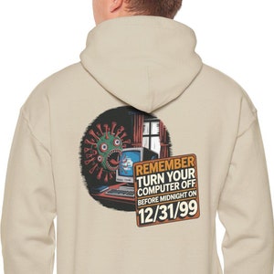 May include: Beige hoodie with a graphic on the back. The graphic features a computer, a monster, and the text "REMEMBER TURN YOUR COMPUTER OFF BEFORE MIDNIGHT ON 12/31/99".