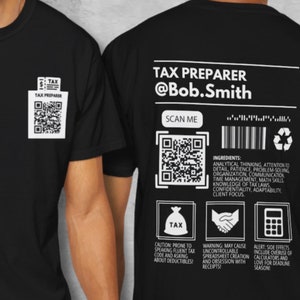 May include: Black t-shirt with a white design that looks like a product label. The label says "Tax Preparer @Bob.Smith" and has a QR code, a barcode, and a list of ingredients for the job. The ingredients include analytical thinking, attention to detail, patience, problem-solving, organization, communication, time management, math skills, knowledge of tax laws, confidentiality, adaptability, and client focus.