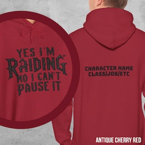 May include: Red hooded sweatshirt with black text that reads "Yes I'm Raiding No I Can't Pause It" on the front and "Character Name Class/Job/Etc" on the back.