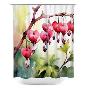 May include: Watercolor painting of a branch of bleeding heart flowers with pink and white petals. The flowers are in bloom and the leaves are green.