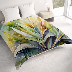 May include: A watercolor duvet cover featuring a vibrant floral design with green, yellow, blue, and orange hues. The design features large, stylized leaves and petals.