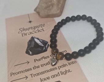 Shunguite and tiger eye ritual bracelet.