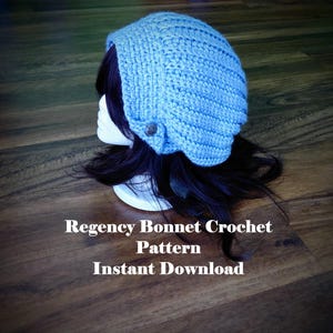 May include: A light blue crochet bonnet with a button detail. The bonnet is displayed on a mannequin head with dark hair. Text at the top reads "Pattern ONLY" and text at the bottom reads "Regency Bonnet Crochet Pattern Instant Download."