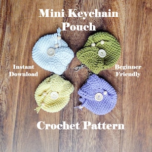 May include: Four crocheted mini keychain pouches in light blue, green, yellow, and purple. Each pouch has a wooden button and a small tassel. The text reads "Mini Keychain Pouch" and "Crochet Pattern".