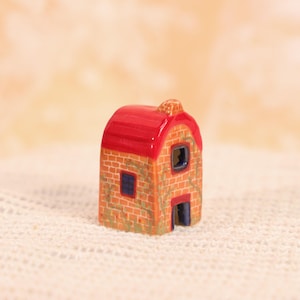 May include: A rustic wooden sign with the text "Welcome to our home" in white lettering. The sign features a distressed finish and a simple, inviting design, perfect for a front porch or entryway.