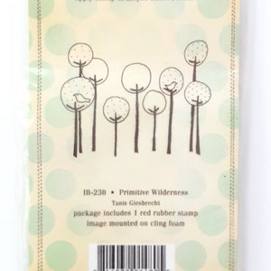 May include: A red rubber stamp with a design of five trees with birds in them. The stamp is mounted on a white foam sheet. The packaging includes instructions for use and a barcode. The text on the packaging reads "IB-238 Primitive Wilderness Tanis Giesbrecht package includes 1 red rubber stamp image mounted on cling foam 8 16032 01480 5 Manufactured by Unity Stamp Company, Inc 100 Central Ave West New London, MN 56273 Made in the USA www.unitystamps.com"