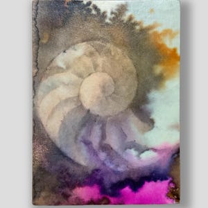 May include: A rectangular artwork featuring a watercolor nautilus shell design. The shell is a light beige color, with a spiral pattern. The background has shades of purple, brown, orange, and pink, creating a vibrant and artistic composition.