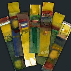 Könnte beinhalten: Eine Sammlung von sechs rechteckigen Lesezeichen mit abstrakten Aquarellmalereien in Gelb-, Grün-, Blau- und Rottönen. Jedes Lesezeichen zeigt einzigartige geschichtete Farbaufträge, feine Tintenlinien und fließende Farbverläufe.