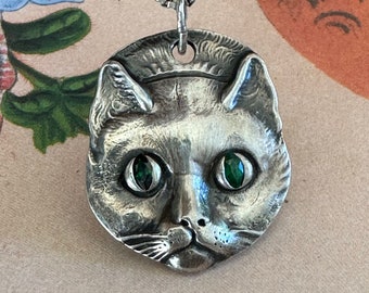 Fine Silver Cat Face with green cubic zirconia eyes - .999 silver (purer than sterling) made from an antique mold w/precious metal clay
