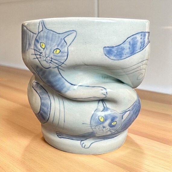 Active Blue Cat Wonky Ceramic Cup - Purposely twisted on the wheel and then etched with cats that aligned with the twists - one of a kind by MaidOfClay