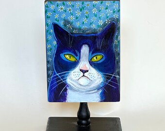 Original painting of blue tuxedo cat with gold eyes against daisy floral background - hand painted in acrylic on wood pedestal