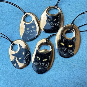 Black Cat ceramic pendants with 22k gold background on black stretch necklace - Group I