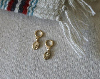 Golden Mini Huggie Hoops w/ Miraculous Medal. 16k gold double plated. Religious jewelry. Minimal