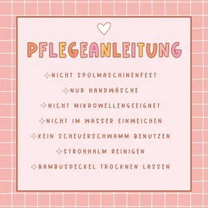 以下が含まれることがあります： オレンジとピンクのテキストで「PFLEGEANLEITUNG」という単語が書かれた、ピンクと白の格子模様のカード。カードには、ドイツ語で「NICHT SP&Uuml;LMASCHINENFEST」や「NUR HANDW&Auml;SCHE」などのケア方法が記載されています。上部には白いハートがあります。