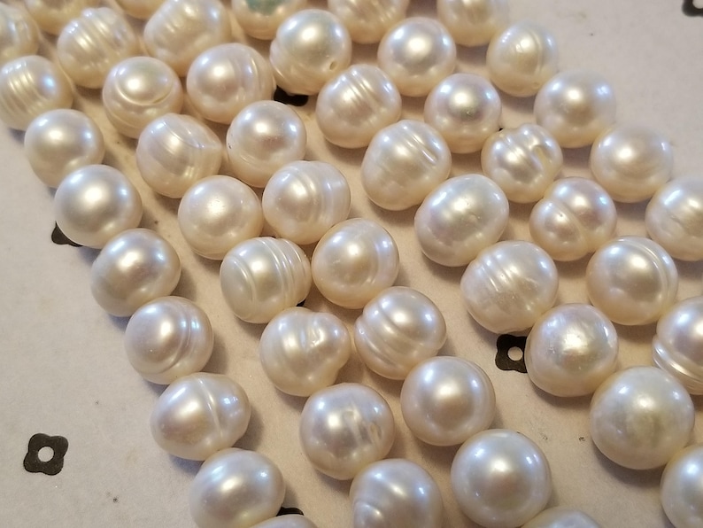 White Freshwater pearls potato shaped 9-11x10mm full strand 14 inch