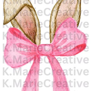 May include: A pair of brown bunny ears with a pink bow tied around the base. The bow is made of a soft, watercolour-like material.